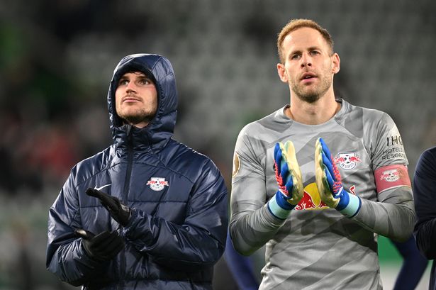 Timo Werner and Peter Gulacsi of RB Leipzig applaud the fans after the DFB cup second round match between VfL Wolfsburg and RB Leipzig at Volkswagen Arena on October 31, 2023 in Wolfsburg, Germany.